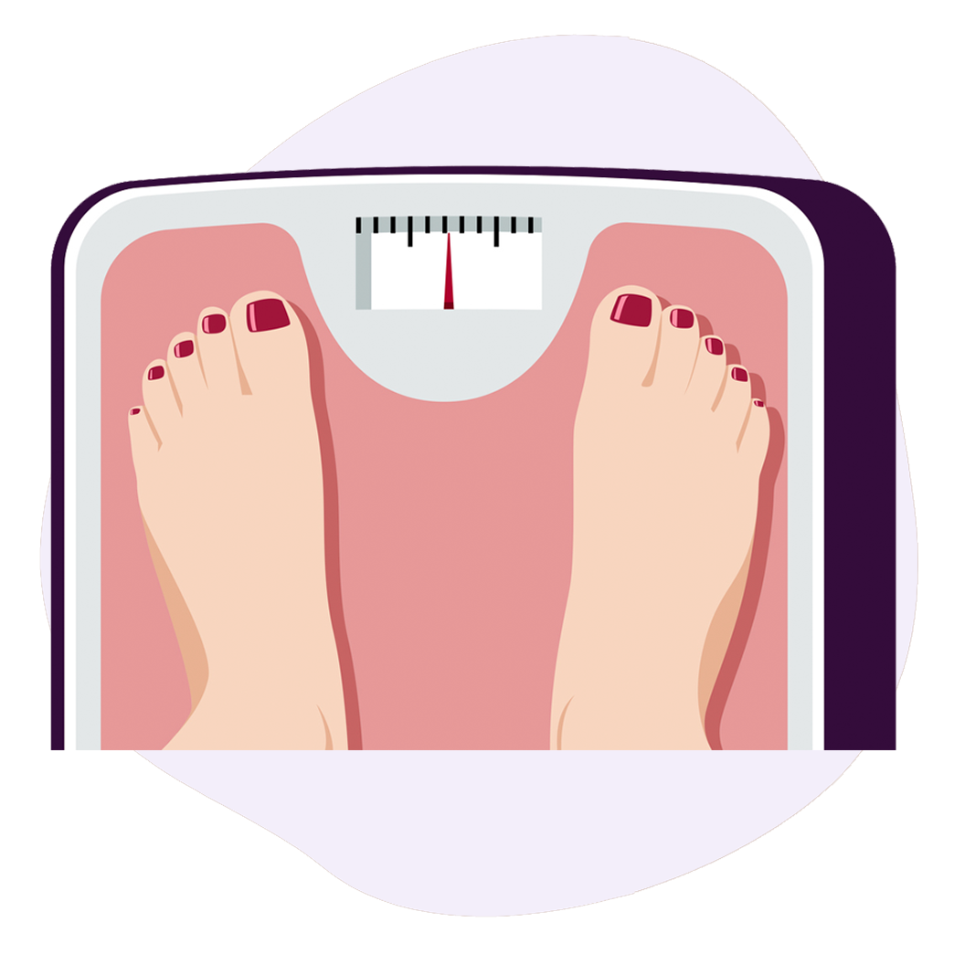 Lady with painted toes in a red color is standing on a scale to check her weight